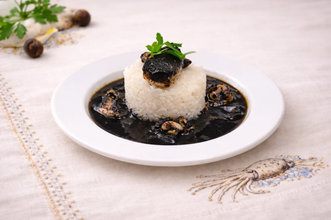 Calamares en su tinta en olla a presión